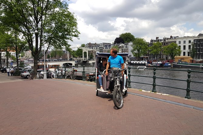1,5 hours Amsterdam Rickshaw Tour - Nieuwmarkt, Rembrandtplein, and Jordaan orientation stops