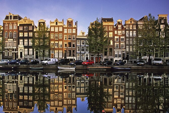 5 hrs Golden Age Amsterdam Private Walking Tour With Local Guide - Amsterdam Centraal to St. Nicholas Basilica, the city explained from the ground up