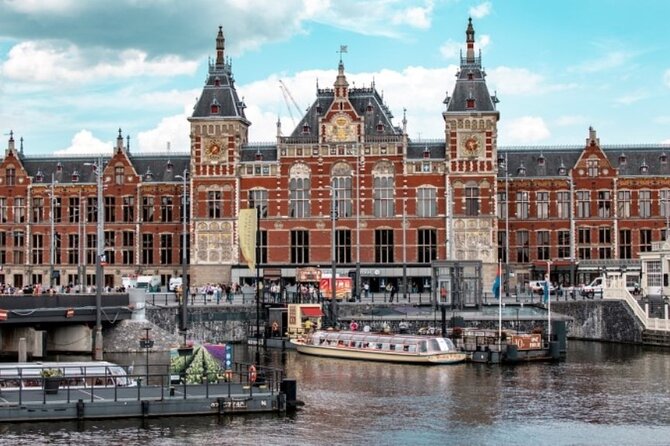 5 hrs Golden Age Amsterdam Private Walking Tour With Local Guide - Weeping Tower, Het Kleinste Huis, and Het Waag: canals, walls, and what trades meant