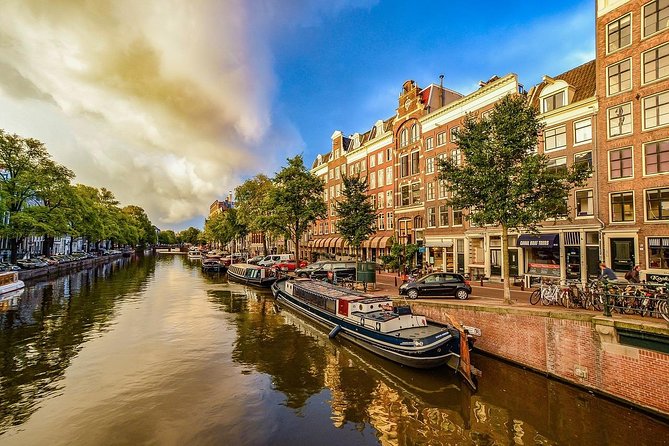 Airport Transfer: Schiphol Airport AMS to Amsterdam by Luxury Van - Timing That Works: Flight Tracking and 60 Minutes Free Waiting