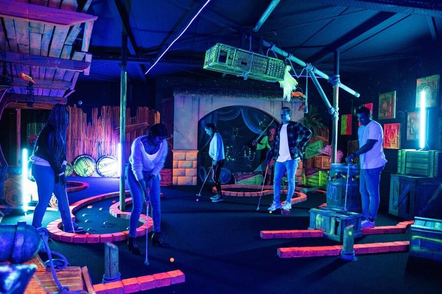 Aloha Amsterdam: 12-Hole Glow-in-the-Dark Mini-Golf - Pirates on ships holes: playful pressure and fast scoring