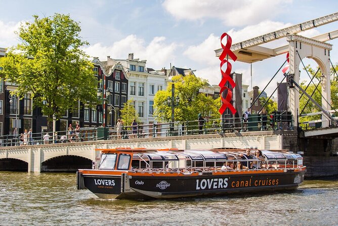 Amsterdam 1h Canal Cruise by Semi-Open Boat with Audio Guide - Meeting at Prins Hendrikkade near Centraal Station
