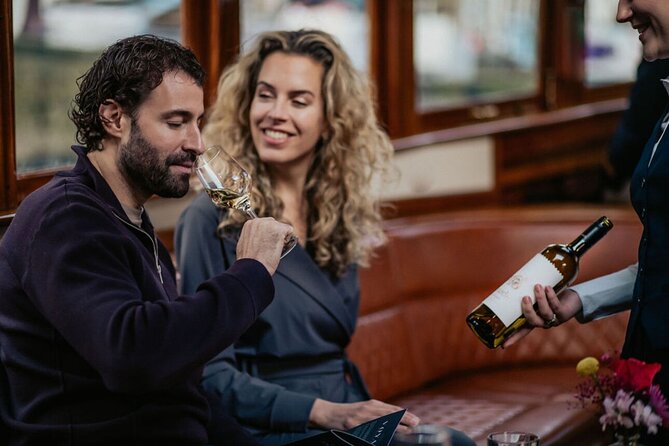Amsterdam: 2-Hour Canal Cruise incl. Drinks & Dutch Snacks - Munt Tower, Bartolotti House, and Westerkerk Views