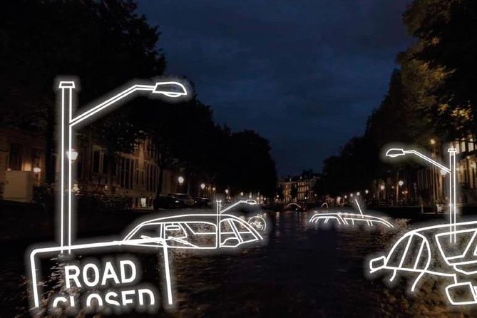 Amsterdam 2-Hour Evening Cruise With Live Guide and Bar - Stopera, mixed emotions, and why the city looks different from water