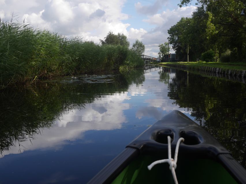 Amsterdam: 2-Hour Guided Canoe Trip - Two Hours of Guided Canoeing, Village Canals to Dutch Wetlands