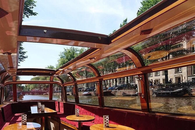 Amsterdam 2 Hour Small-Group Canal Cruise with Dutch Snacks & Bar - Rijksmuseum, NEMO, and Central Station: art, science, and a major hub