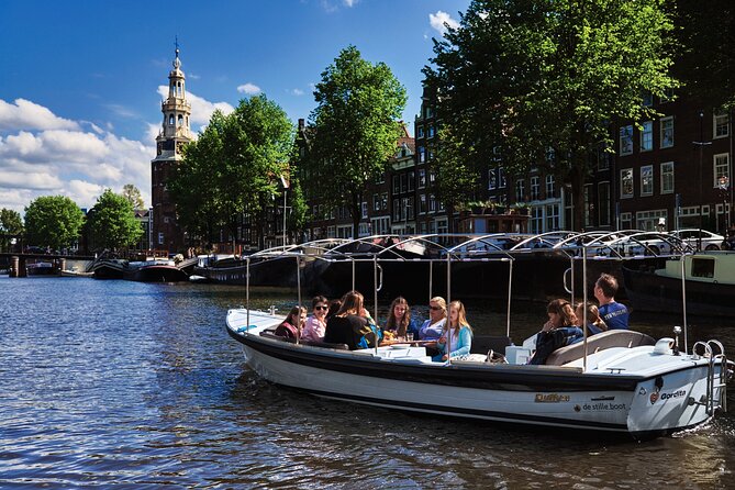 Amsterdam: 60-Minute Guided Private Canal Cruise with Drinks - Where you meet and how the boat experience feels in practice