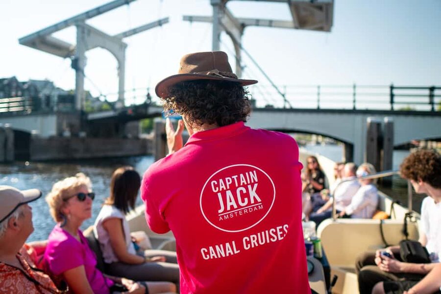 Amsterdam: 90 min Cosy Canal Cruise w. Bar & Snacks on board - Captain Jack meeting points: two options, one easy plan