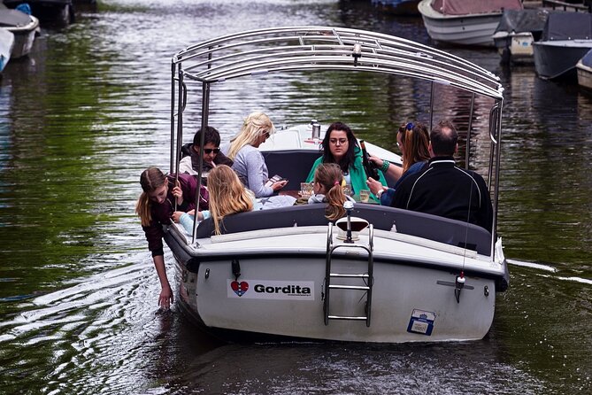 Amsterdam 90-min Private Canal Cruise with Live Guide and Drinks - Herengracht and the Golden Bend for big, classic views
