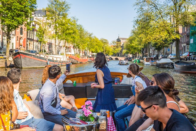 Amsterdam All-Inclusive 90-Minutes Heated Cruise by Captain Jack - Unlimited Heineken and snacks: value that still has limits