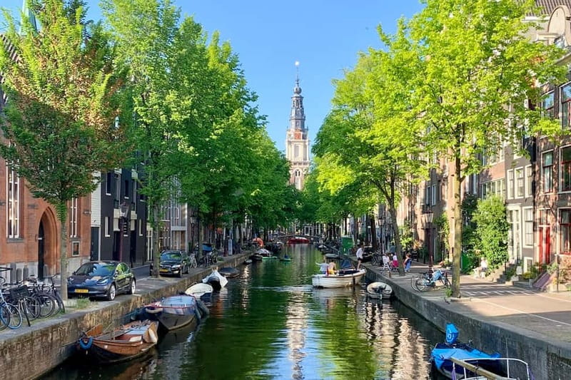 Amsterdam: Anne Frank Guided Walking Tour in DE/EN/IT/ES - De Waag to Nieuwmarkt, where your story starts