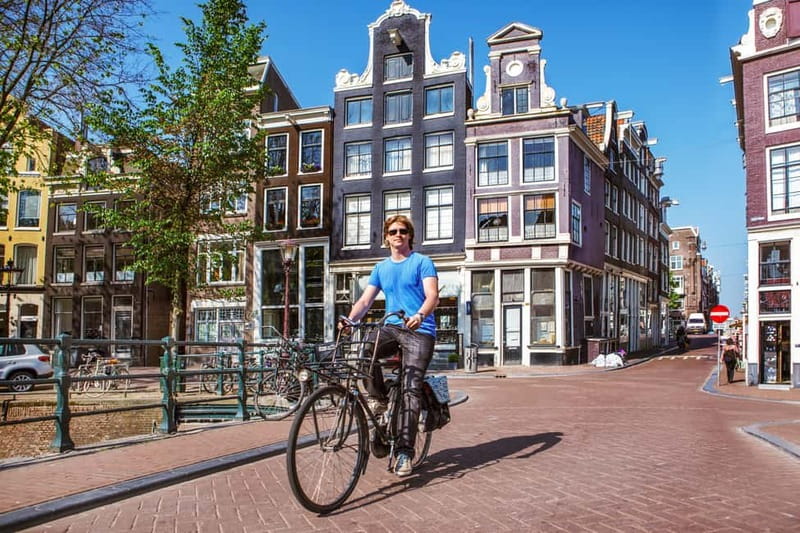 Amsterdam:: Bike Rental with Free Self-Guided Tour - The self-guided app: GPS stories, language options, and traffic help