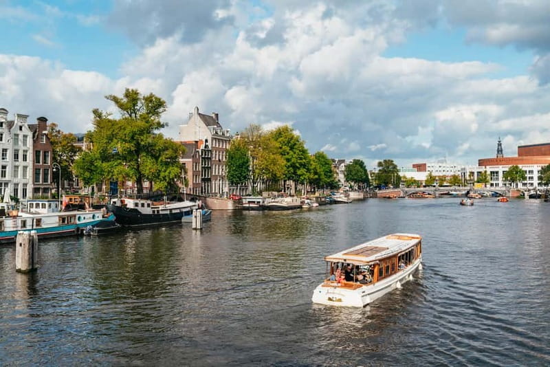 Amsterdam Bike Tour in Small Group + Optional Canal Cruise - Optional 1-hour canal cruise with drinks and cheese