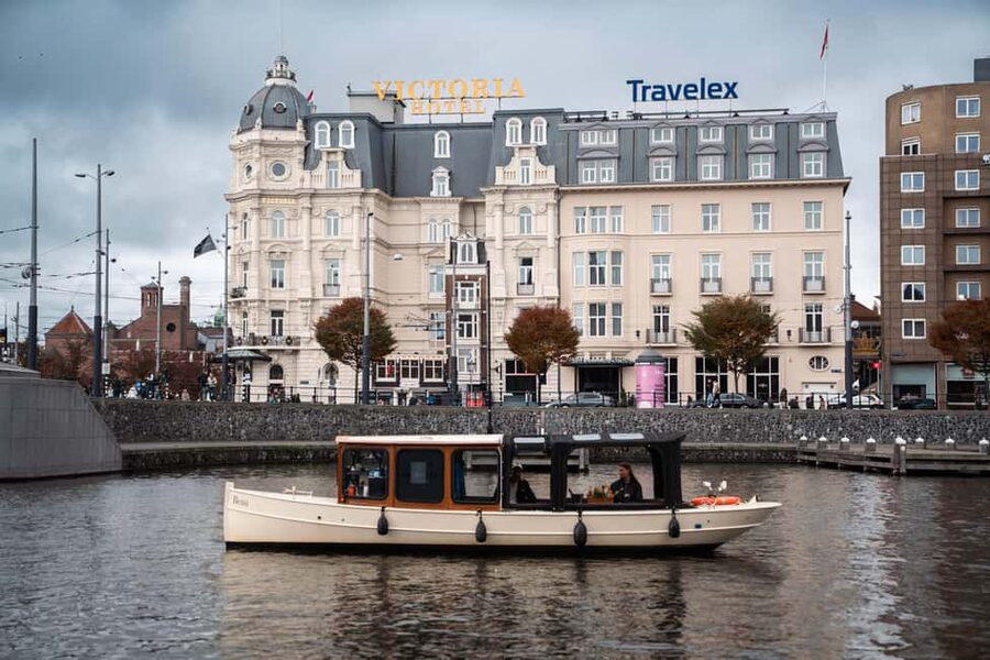Amsterdam Canal Boat Tour with Live Guide - Key highlights to know before you go