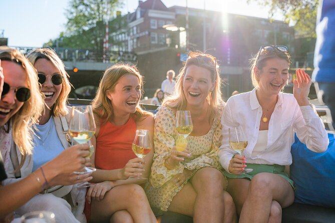 Amsterdam: Canal Booze Cruise with Unlimited Drinks Option - What the small group limit changes for your experience