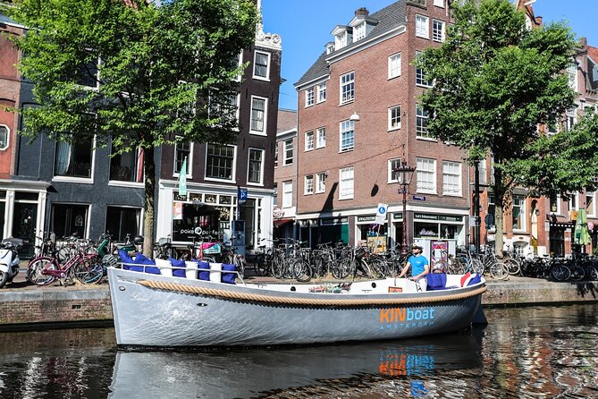 Amsterdam Canal Cruise in Open Boat with Unlimited Drinks Option - Price at $21.77 and how to judge the value