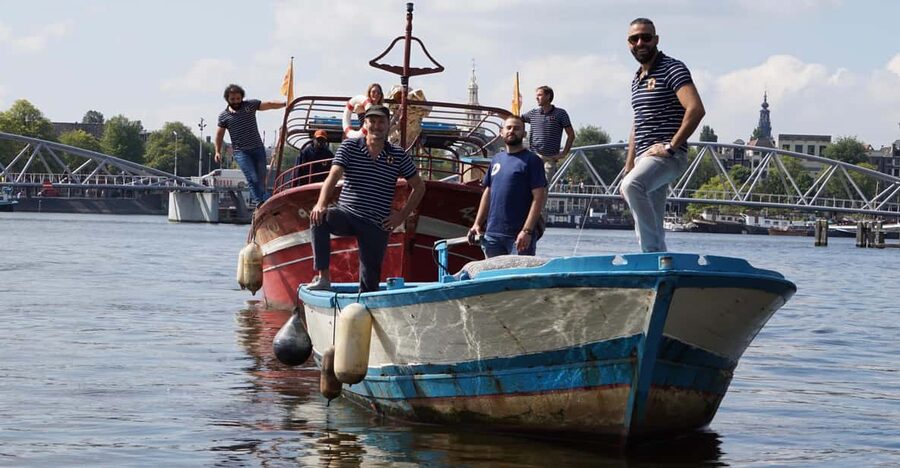 Amsterdam: Canal Cruise on a Wooden Refugee Boat - Key things to know before you go