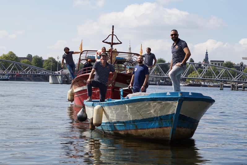 Amsterdam: Canal Cruise on a Wooden Refugee Boat - What the 90 minutes feels like as you sail canals and the Amstel