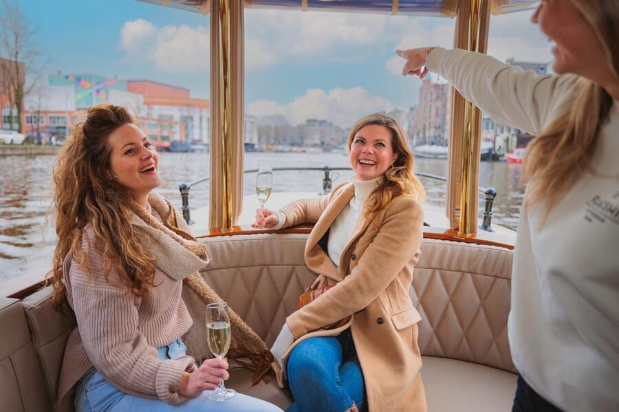 Amsterdam: Canal Cruise with Bubbles & Bites - Your Skipper and Live Guide: The Part That Makes It Feel Personal