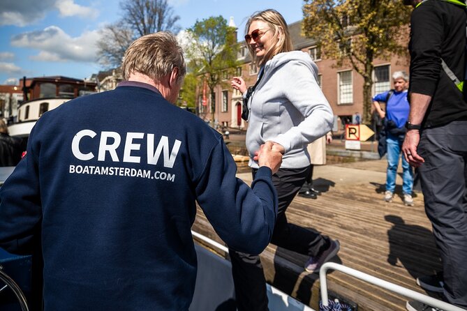 Amsterdam Canal Cruise with Live Guide and Two Drinks - Open-air electric boat, live guide, and the fast way to get oriented