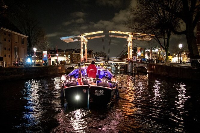 Amsterdam Canal Cruise With Live Guide and Unlimited Drinks - The live guide experience: what you learn while you’re floating