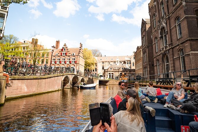 Amsterdam Canal Cruise with Live Guide - Central Station - Stop-by-stop canal time: what to look for from Dutch National Opera to the science museum