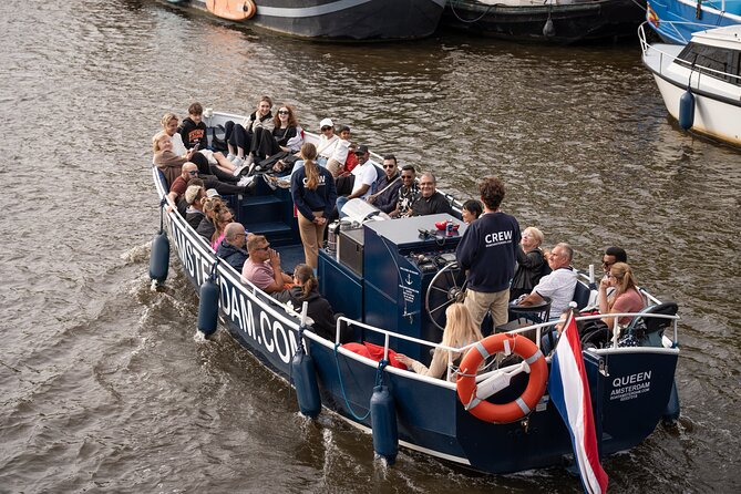 Amsterdam Canal Cruise with Live guide & Two drinks - Central St. - The onboard experience: two drinks, restroom access, and a relaxed pace