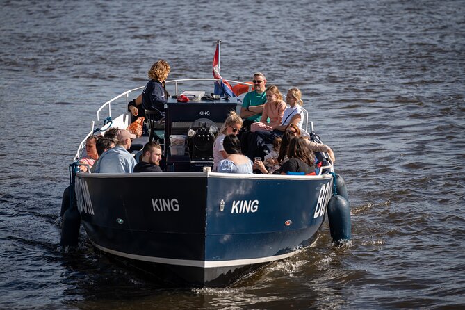 Amsterdam Canal Cruise with Live guide & Two drinks - Central St. - Weather and departure timing: choosing the right slot