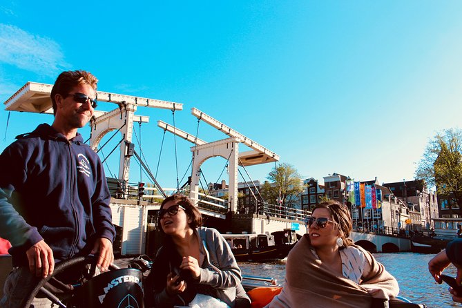 Amsterdam Canal Tour by Open Boat – 90 min Small Group Experience - Boarding on Nieuwe Keizersgracht: the open-boat feel right away