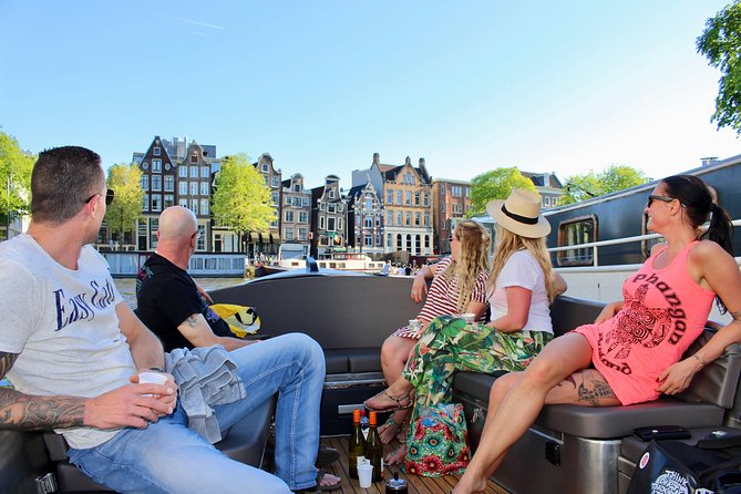 Amsterdam Canal Tour by Open Boat – 90 min Small Group Experience - Amstel River highlights first: dancing houses and leaning facades