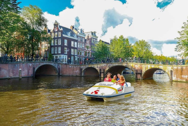 Amsterdam: Chart Your Own Canal Course by Pedal Boat - Canal freedom, with a skipper in the background