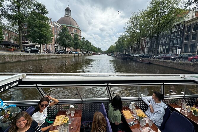Amsterdam Cheese and Wine Canal Cruise - Skinny Bridge, Amstel Church, and the Hermitage annex stop you won’t rush past