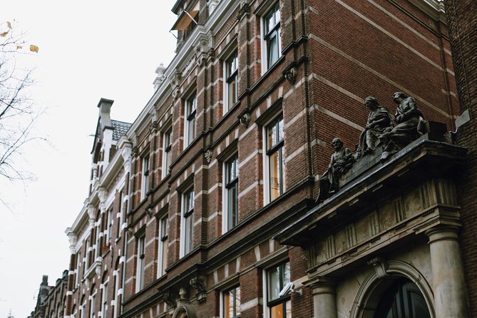 Amsterdam City Center & History - Exclusive Guided Walking Tour - St. Nicholas Basilica to the Weeping Tower: Faith Meets the City’s Edge