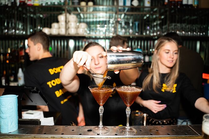 Amsterdam: City Centre Bar Crawl and Nightlife Experience - Stop 1: The Black Tiger on the Red Light Crawl Route