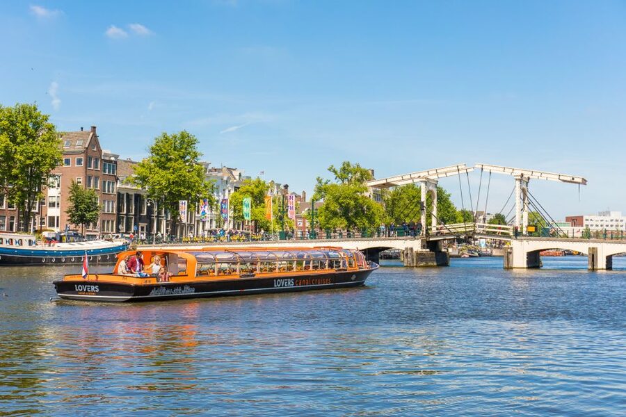 Amsterdam: City Centre Canal Cruise including Audioguide - Entering Amsterdam by Water, What This Cruise Actually Feels Like