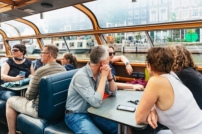 Amsterdam City Centre Cruise on heated boat with Audioguide - Boat Comfort, WiFi, Restroom, and the Real Photo Trade-Off