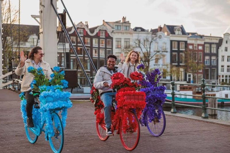 Amsterdam: City Centre, Guided Bike Tour on Flower Bikes - Price for a 1.5-Hour Canal and City-Center Ride