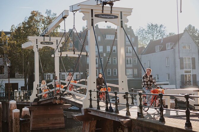 Amsterdam City Top Highlights Guided Bike Tour - Meeting at Nieuwezijds Voorburgwal and getting your bike fit right