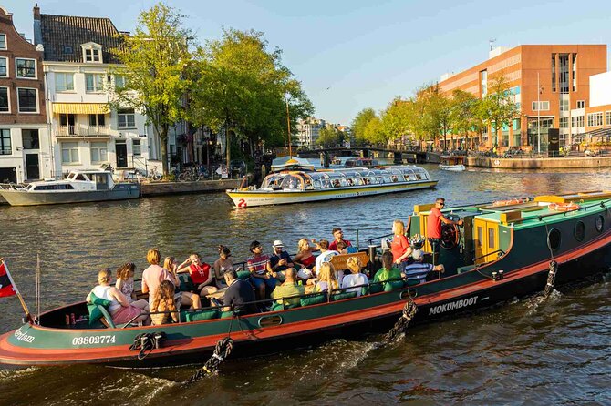 Amsterdam Classic Canal Cruise on a Historic Tugboat - Meeting at Central Amsterdam, Then Letting the Canals Set the Pace