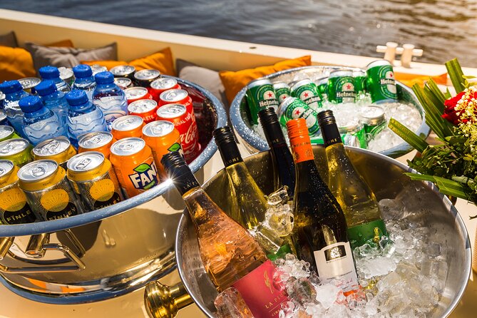 Amsterdam Classic Saloon Boat Canal Cruise with Live Guide - Guides that keep the hour moving (and fun)