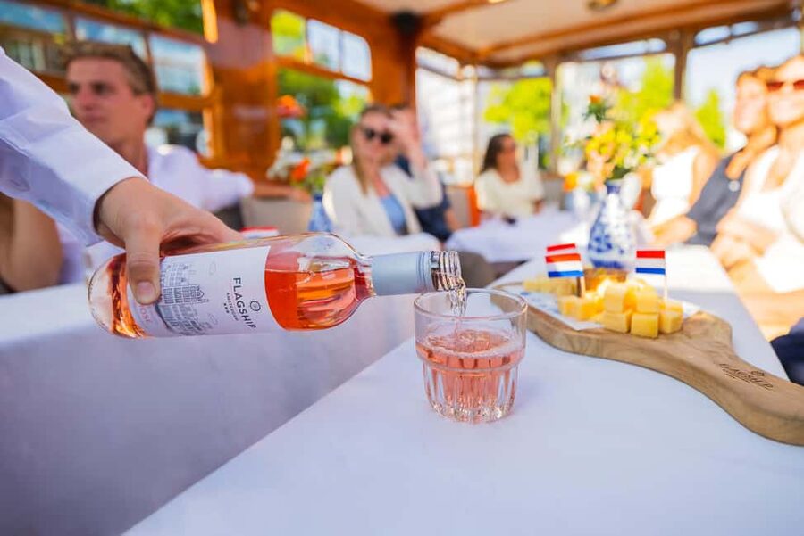 Amsterdam: Classic Saloon Boat Cruise with Cheese & Wine - A 1-hour canal cruise that feels like Amsterdam’s “greatest hits”