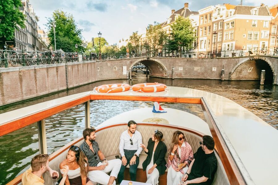 Amsterdam: Classic Saloon Boat Cruise with Cheese & Wine - Onboard comfort: classic saloon style, modern boat power