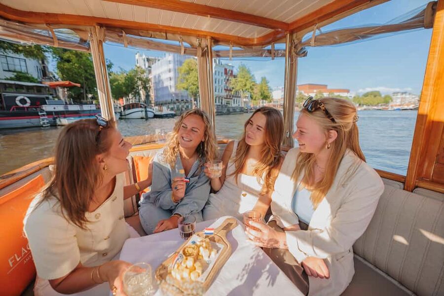 Amsterdam: Classic Saloon Boat Cruise with Cheese & Wine - How the live hosts make it better than a standard canal trip