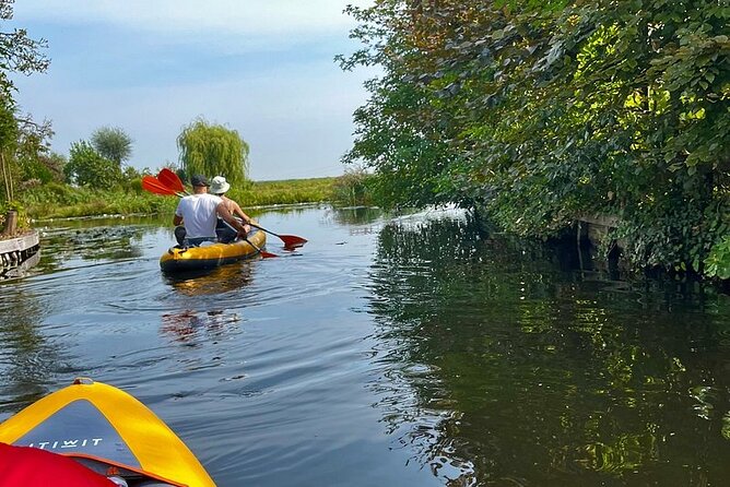Amsterdam Countryside Bike and Kayak Tour - Watergang village: the countryside reset, the church break, then wetlands kayaking