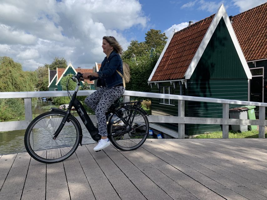 Amsterdam: Countryside Bike Tour and Zaanse Schans Windmills - Pace, Small Group Energy, and Hans Keeping Everyone Together