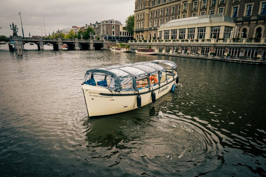 Amsterdam: Covered Canal Booze Cruise with Unlimited Drinks - Choosing the Dock: Amstel 178 vs Oudezijds Voorburgwal 230