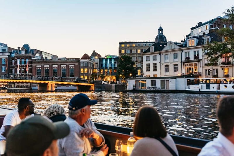 Amsterdam: Cozy Cheese & Wine Cruise Tasting Experience - Under Magere Brug (Skinny Bridge): why this stop matters