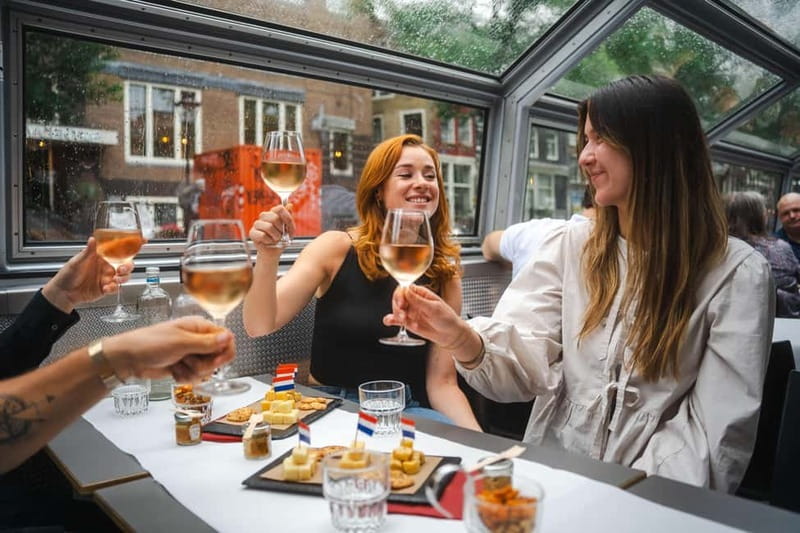Amsterdam: Cozy Cheese & Wine Cruise Tasting Experience - Heated boat comfort, 18+ calm, and seating gotchas