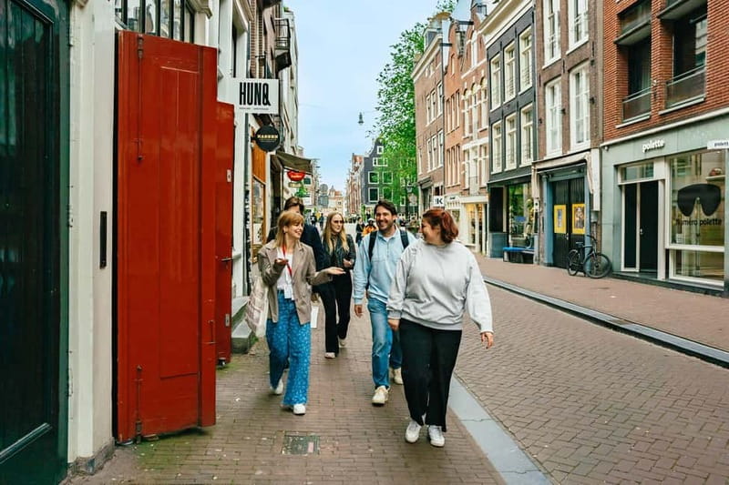Amsterdam: Cultural Highlights Walking Tour - Royal Palace, the Nieuwe Kerk, and Torensluis Bridge clues