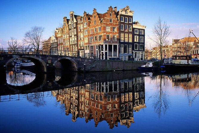 Amsterdam: E-Bike Sightseeing Tour - The ride itself, what it feels like, and how guides keep things safe